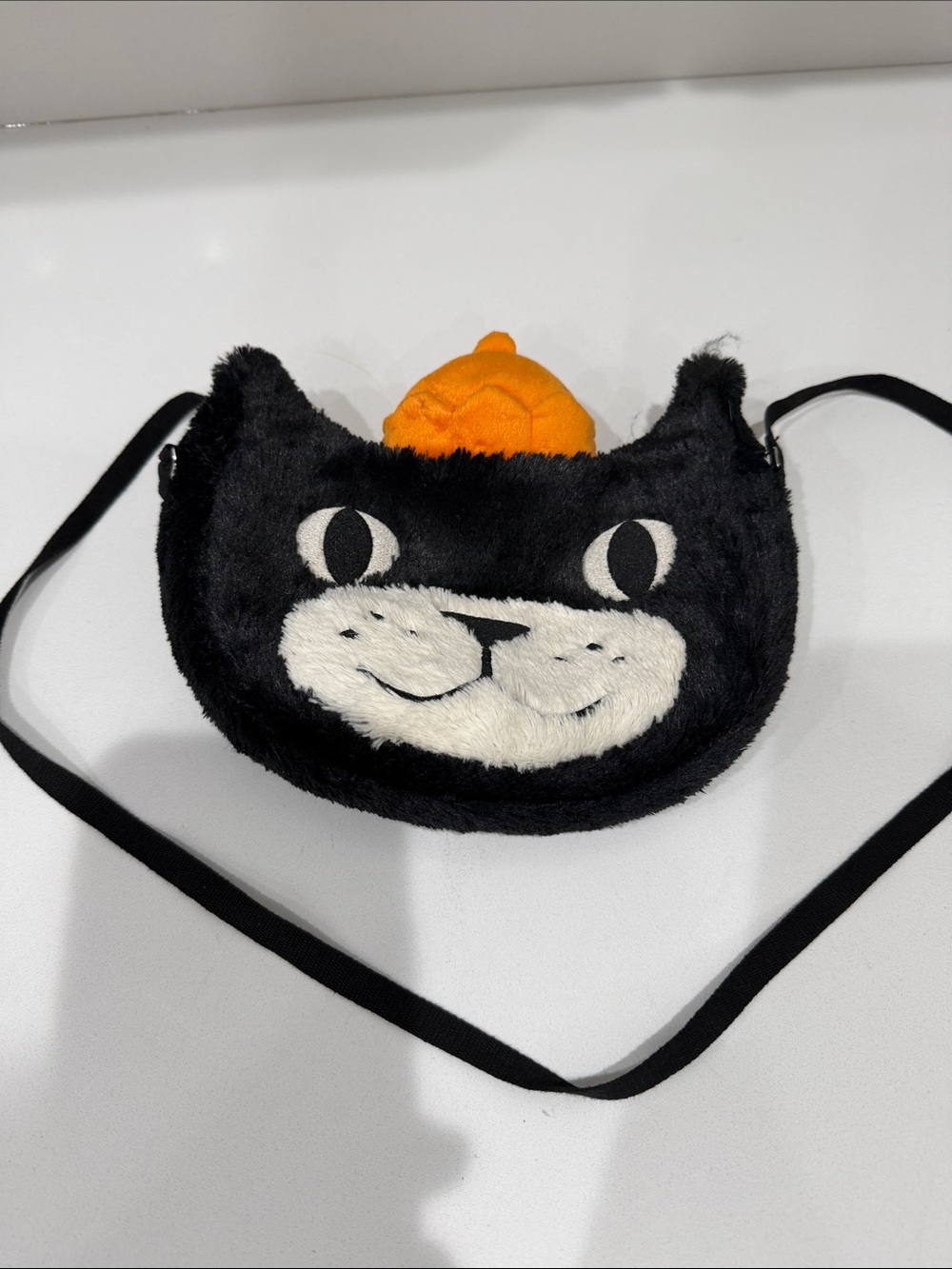 Jellycat Black Cat Crossbody Bag with Orange Hat
